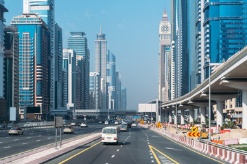 Wall Mural - Sheikh Zayed Road in Dubai downtown with car traffic and high buildings.