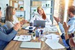 © Krakenimages.com - Group of business workers smiling happy and confident. Working together with smile on face applauding one of them wearing king crown at the office