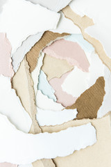 Canvas Print - Torn pastel paper pile