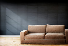 Brown Sofa In A Room With Gray Walls