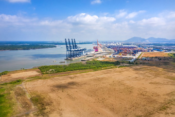 Wall Mural - Top view aerial of International  container port Tan Cang - Cai Mep. Ba Ria, Vung Tau, Vietnam. Connect to Ho Chi Minh City by Thi Vai river and national road 51