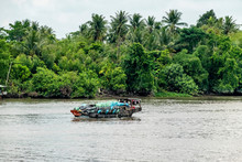 Boat Transporting Poultry On The Mekong River. Vinh Long, Vietnam, Mekong Delta.
