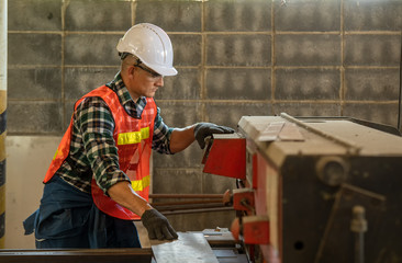 Poster - Worker in uniform operating in manual lathe in metal industry factory,Industry,Engineer,Construction concept.