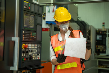 Aufkleber - Female engineer wearing protective mask to Protect Against Covid-19 in the factory,Coronavirus has turned into a global emergency,Coronavirus Disease 2019 (COVID-19).