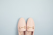 Woman pink pastel shoes over blue background. Fashion blog, sprind and summer urban style, online shpping. Minimal flat lay, top view