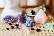 Colorful healing crystals on a wicker surface