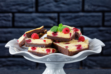 Canvas Print - vegan chocolate cheesecake bars on a cake stand