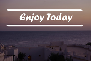 Wall Mural - Inspirational motivation quote with the phrase Enjoy today, dawn over the sea.