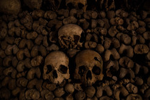 Close-up Of Human Skulls In Cave