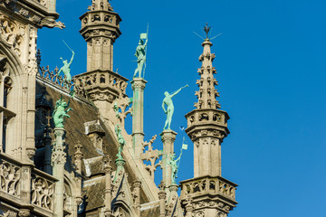 Wall Mural - Statues on the roof of the Gothic Revival style Maison du Roi / Broodhuis building the Brabantine Gothic style facades on Grand Place in Brussels Belgium