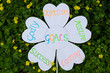 © GeorgeLaurentiu - Goals definition concept explained as Godly objectives assure lasting success handwritten on flower shaped cardboard placed on a garden floor background