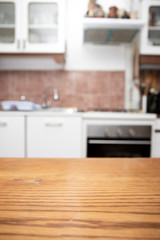 Blurred kitchen interior with desk space