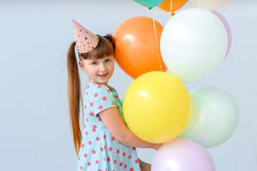 Poster - Little girl celebrating Birthday on color background