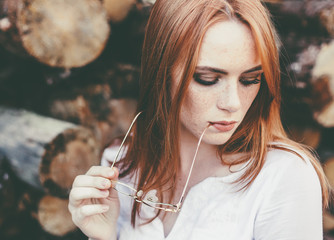 Beautiful woman natural face freckles casual female portrait lifestyle beauty girl in eye glasses