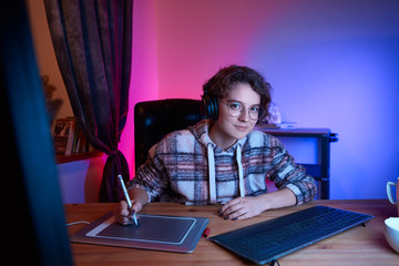 Aufkleber - Digital desinger using graphic tablet and stylus. Freelancer desinger working from home