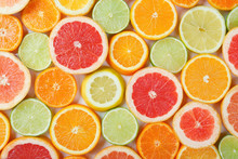 Flat Lay Of Citrus Fruits Like Lime, Lemon, Orange And Tangerine