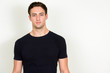 © Ranta Images - Portrait of young handsome man looking at camera