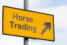 AA Street Sign Giving Directions To Horse Trading Area