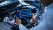 © Gorodenkoff - Car Service Manager or Mechanic Uses a Tablet Computer with a Futuristic Interactive Diagnostics Software. Specialist Inspecting the Vehicle in Order to Find Broken Components In the Engine Bay.
