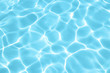 Perfect texture of clear blue water in the swimming pool. Top view. Abstract background