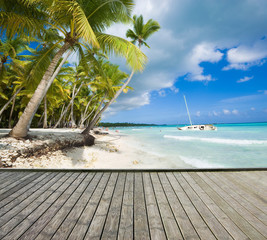 Wall Mural - Empty wooden platform beside tropical beach at Saona island, Dominican Republic