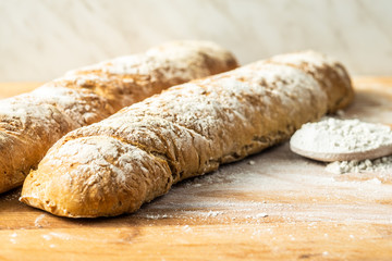 Fresh whole grain bread baguette.