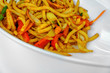 © HungryBild - Closeup of a tasty japanese plate of Udon. This is a traditional japanese plate with wheat flour spaghetti, vegetables and shrimps.