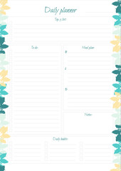 White daily planner with bright leaves design.