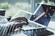 © Pixels Hunter - Abstract creative financial graph with upward arrow and hands typing on laptop on background, financial and trading concept. Multiexposure