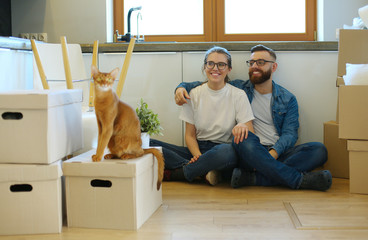 Young couple moving in to new home together