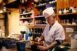 © hideo tsuto - 開店前に仕込みをする料理人