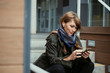 © rawpixel.com - Woman listening to music on the steps
