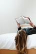 © rawpixel.com - Woman reading a book on her bed during coronavirus quarantine