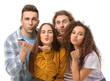 © Pixel-Shot - Friends taking selfie on white background