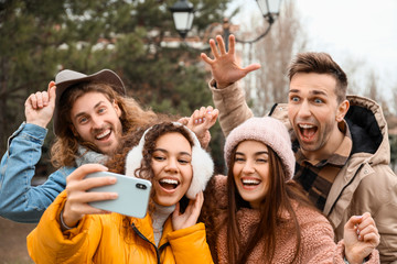 Poster - Happy friends taking selfie outdoors