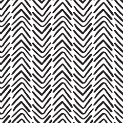 Black and white grunge herringbone vector seamless pattern. Abstract hand drawn doodles background with chevrons for fabric, wallpaper, invitation cards or scrapbooking projects.