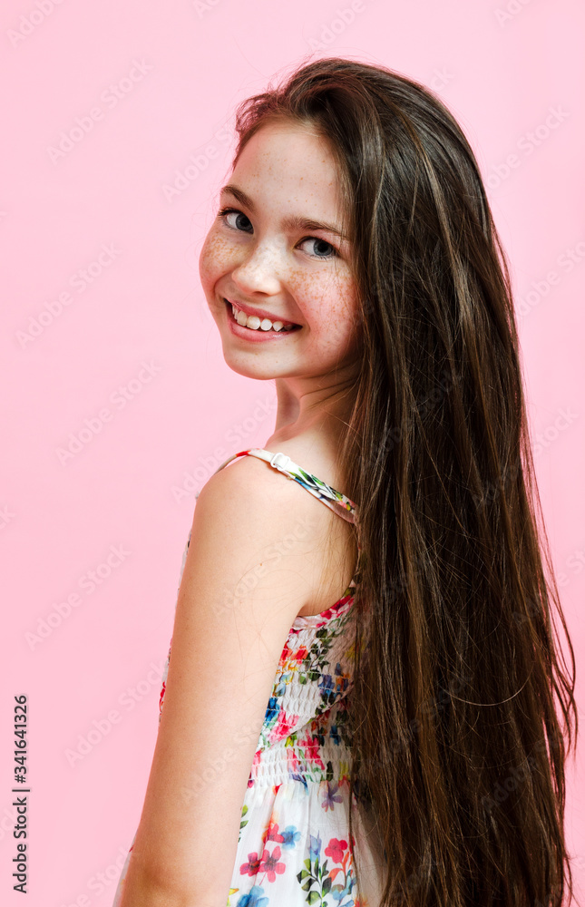 pre-teen portrait Portrait of adorable smiling little girl child preteen isolated の Stock フォト  | Adobe Stock