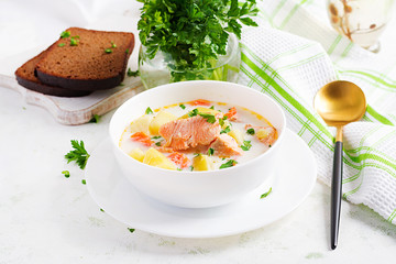 Wall Mural - Kalakeitto. Creamy soup with salmon, potatoes, onions and carrots and  in a bowl. Finnish/ karelian cuisine. Lohikeitto