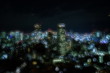 Double Exposure Of Illuminated Cityscape