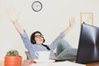 © Ann Patchanan - selective focus young beautifulasian woman wore blue striped shirt sitting Sitting at the desk,work online lifestyle relax at home with coffee ,home working with laptop,work from home