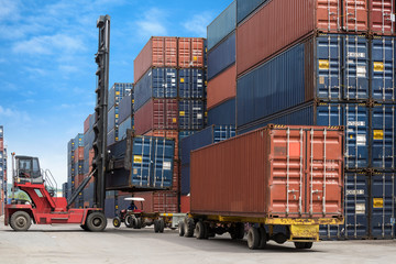 crane lifting container box to container truck a logistics transports in shipyard, a supply chain technology and logistics concept  