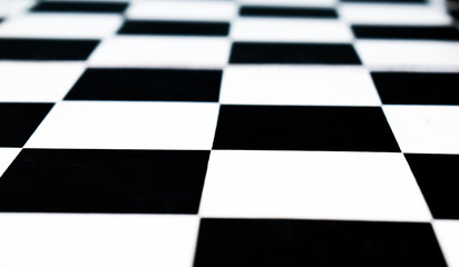 Isolated black and white colored chess board with no chess pawns placed on it