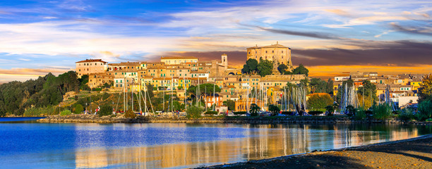 Wall Mural - travel in Italy - picturesque tranquil Capodimonte village and beuautiful lake lago Bolsena, Lazio region