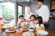 © Odua Images - thristy family drinking sweet drink for breaking the fast on ramadan month