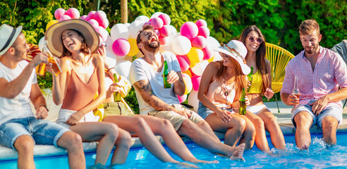 Canvas Print - Group of friends having fun on pool party