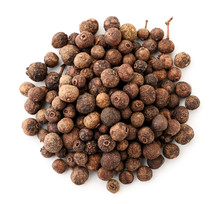 A Pile Of Dried Allspice On A White Background. The View From Top