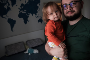 Wall Mural - Dad and his daughter at home.