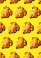 Wall Mural - colorful pattern of roasted chicken or turkey on yellow background. top view. creative design for pa