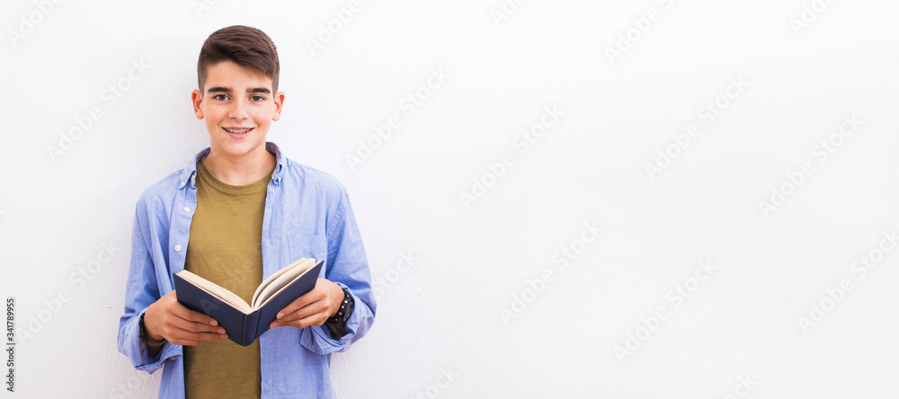 young teenager student with book isolated on white background - obrazy, fototapety, plakaty 
