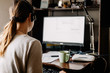 © Максим Галінский - Young woman talking to customers at home online call center. An office worker who is forced to work from home due to quarantine isolation
